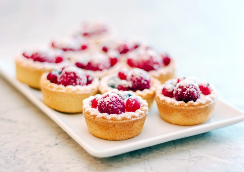 Small,Tarts,With,Berries,On,White,Plate.